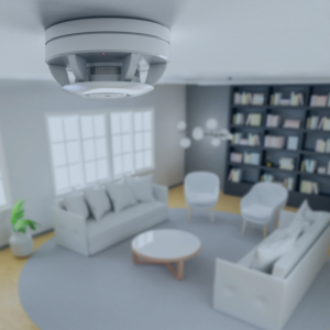 smoke detector on the ceiling of a living room with two couches, a rug, coffee table, and bookshelves